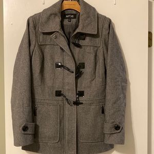 Warm winter coat with cute toggle buttons and a zipper.